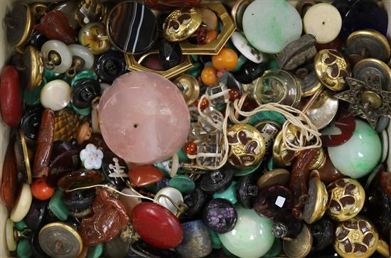 A large quantity of assorted buttons, hardstone and loose cut gemstones.